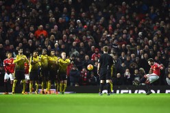 Manchester United winger Juan Mata (extreme right) scored off a free kick to help the Red Devils win over Watford, 1-0.