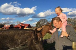 Seen here are Rory Feek along with his toddler daughter. Rory founded a duo with his wife Rory Feek called Joey+Rory and released several hits including 