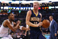 Former Indiana Pacers forward Chase Budinger drives past Boston Celtics' Evan Turner in this file photo.