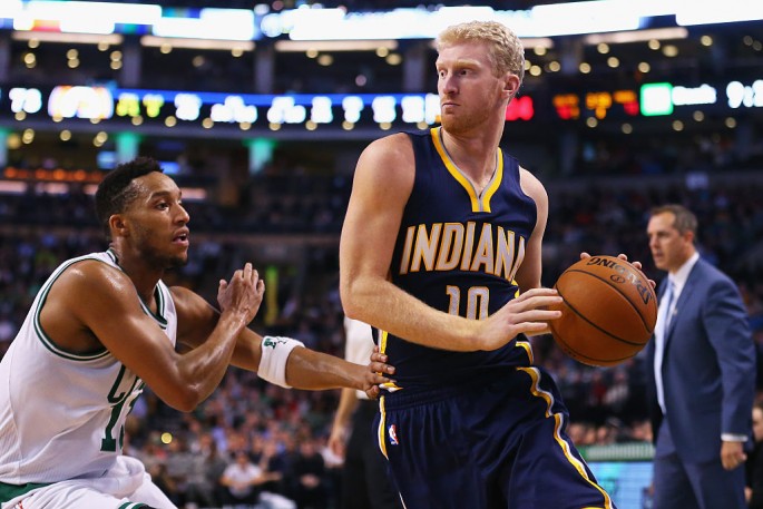 Former Indiana Pacers forward Chase Budinger drives past Boston Celtics' Evan Turner in this file photo.