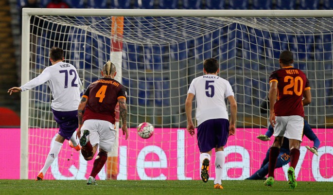 Fiorentina winger Josip Ilicic (#72) scores a consolation goal against Roma.
