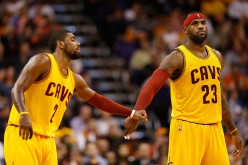 Cleveland Cavaliers players Kyrie Irving (L) and LeBron James.