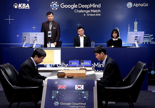 South Korean professional Go player Lee Se-Dol (R) faces Google's AI program, AlphaGo, during the Google DeepMind Challenge Match in Seoul, South Korea, on March 10, 2016.