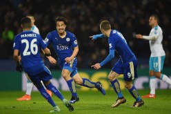 Leicester City striker Shinji Okazaki (C) celebrates the game winner against Newcastle United with teammates Riyad Mahrez and Jamie Vardy.