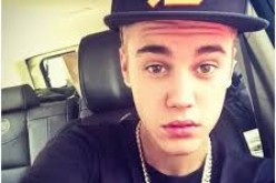 Canadian pop star Justin Bieber is known for his hits 