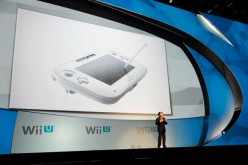 Satoru Iwata, Global President, Nintendo Co., Ltd., speaks during a news conference after the unveiling of the new game console Wii U at the Electronic Entertainment Expo.