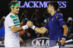 Novak Djokovic of Serbia shakes hands after winning in his semi final match against Roger Federer of Switzerland during day 11 of the 2016 Australian Open at Melbourne Park in Melbourne, Australia. 