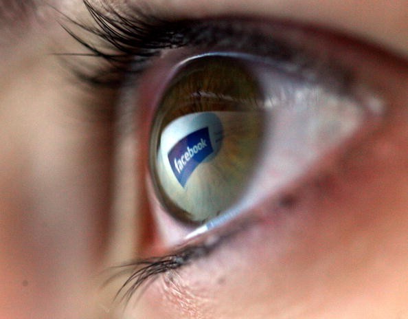 In this photo illustration the facebook logo is reflected in the eye of a girl on February 3, 2008 in London, England.
