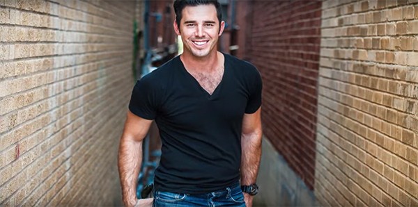 An image of Craig Strickland posing for a photoshoot.