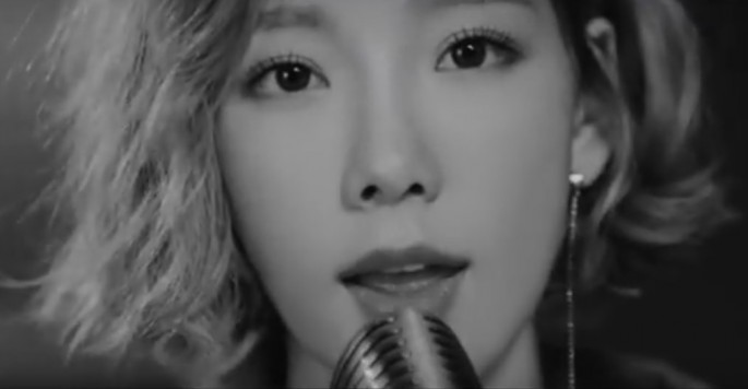 Taeyeon on her "Rain" music video.