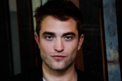 Robert Pattinson attends a photo call for 