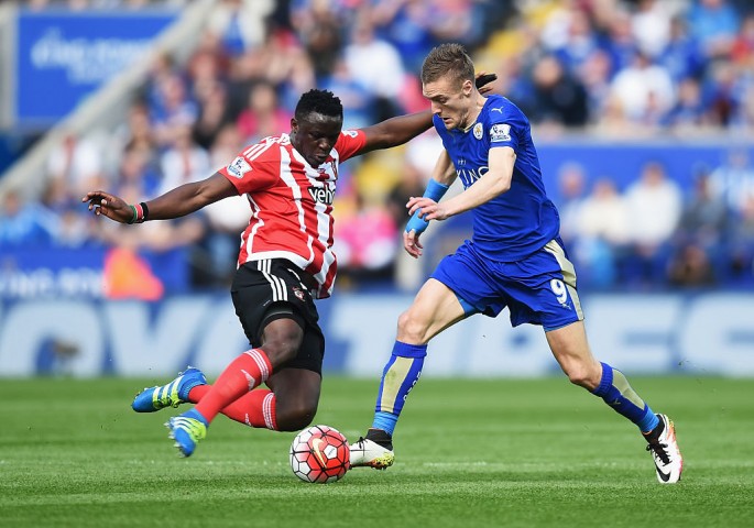 Southampton midfielder Victor Wanyama (L) competes for the ball against Leicester City's Jamie Vardy.