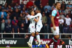 Crystal Palace striker Dwight Gayle celebrates his goal against West Ham with teammate Jason Puncheon.