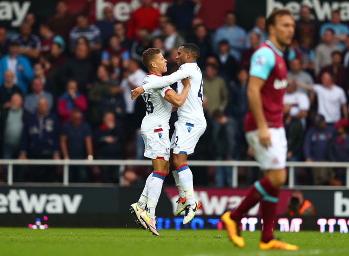 Crystal Palace striker Dwight Gayle celebrates his goal against West Ham with teammate Jason Puncheon.