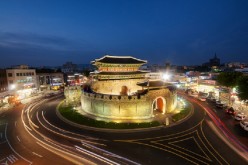 In the middle of it all: The southern gate of South Korea’s Hwaseong Fortress in Suwon, Gyeonggi-do, lights up at night.