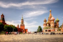 A splash of colors: (L) Kremlin and (R) the Cathedral of Vasily the Blessed or St. Basil's Cathedral sit at the Red Square in Moscow, Russia.