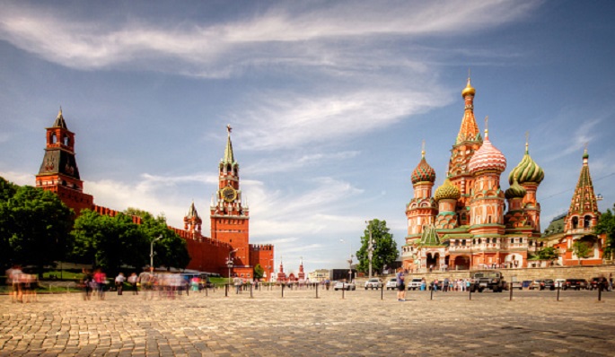 A splash of colors: (L) Kremlin and (R) the Cathedral of Vasily the Blessed or St. Basil's Cathedral sit at the Red Square in Moscow, Russia.
