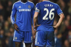 Former Chelsea striker Demba Ba (L) and John Terry during their time together at the Stamford Bridge.