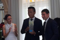 Merci! Liu Ye is flanked by his French wife Anais Martane and David Lisnard, mayor of Cannes, during his appointment as travel ambassador for the French Riviera.