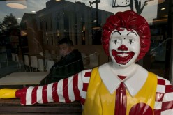 A smile a day keeps the worries away: A Ronald McDonald statue outside a McDonald's outlet in Hangzhou, Zhejiang Province.