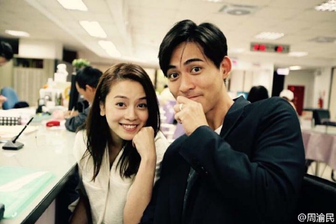 Vic Chou shows off his wedding ring with wife Reen Yu at a household registration office in Taiwan where they made it official, Nov. 10, 2015.
