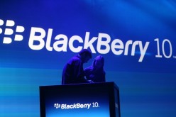 Workers prepare the stage during BlackBerry 10 launch event in 2013.