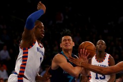 Jeremy Lin of the Charlotte Hornets drives hard to the rim against the New York Knicks at Madison Square Garden on November 17, 2015.