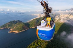 Vinicius, the Olympic mascot, starts the countdown for the Rio 2016 Olympic Games as it rides from the top of the Sugarloaf Cable Car in Rio de Janeiro, Brazil, on March 23, 2015.