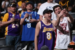 Fans wear an array of jerseys as they attend the game to see Kobe Bryant in his final game at Pepsi Center in Denver, Colorado.
