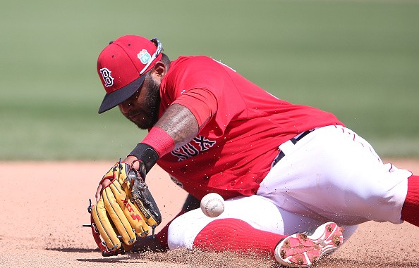 Pablo Sandoval knocks the ball down at third base during the fourth inning of the Spring Training Game on March 14, 2016.