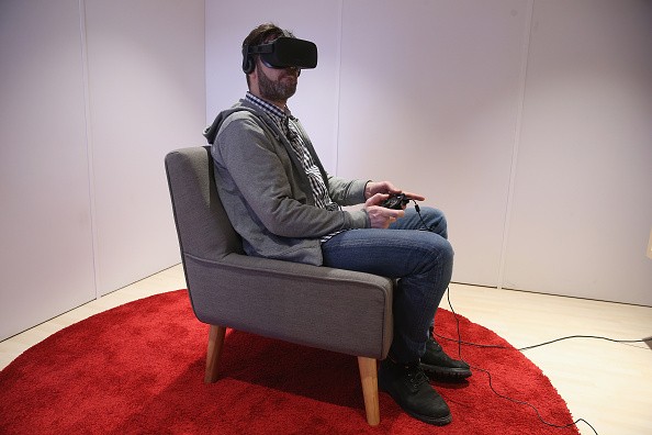  A visitor tries out the Oculus Rift virtual reality goggles at the Facebook Innovation Hub on February 24, 2016 in Berlin, Germany.