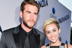 Miley Cyrus and Liam Hemsworth are seen on Monday April 11 as they attend the premiere of “The Huntsman: Winter’s War” in Los Angeles, California. 