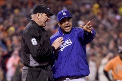  Dodgers manager Dave Roberts argues with home plate umpire Jeff Kellogg in the bottom of the eighth inning against the San Francisco Giants.