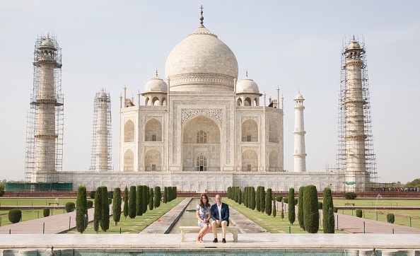 Prince William, and Duchess of Cambridge, Kate Middleton sit in front of the Taj Mahal on April 16, 2016.   