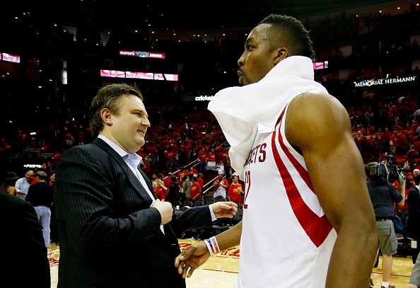 Daryl Morey congratulates Dwight Howard after coming out with a victory against the Utah Jazz.