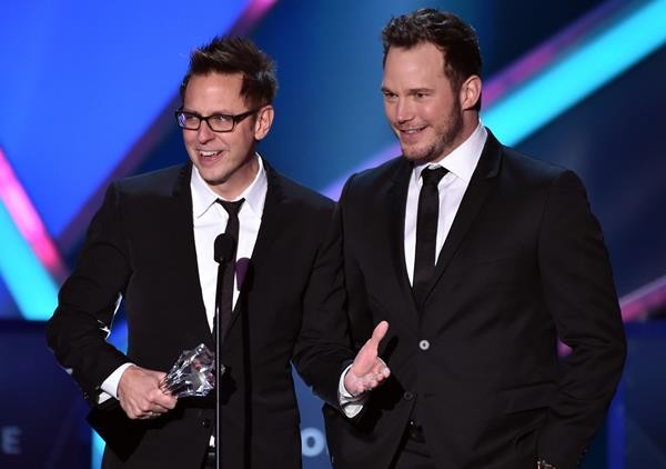James Gunn accepts an award on stage with "Guardians of the Galaxy" star Chris Pratt.
