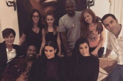 Kardashian family poses together for pictures while shooting 