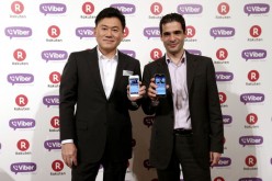 Rakuten, Inc. CEO Hiroshi Mikitani and Viber CEO Talmon Marco pose for photos in 2014. 