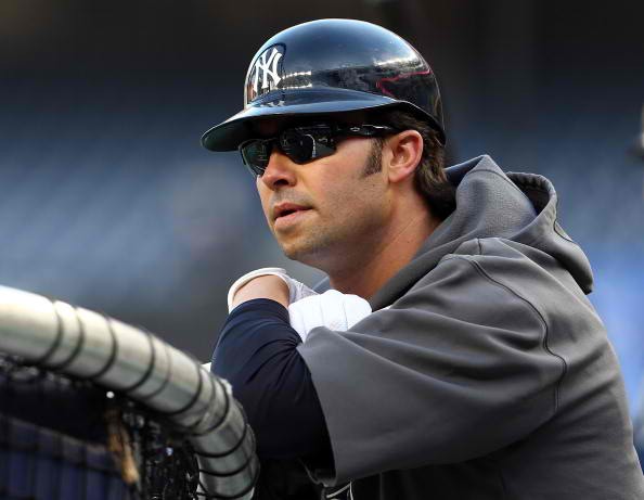 Nick Swisher of the New York Yankees looks on during batting practice in 2012.
