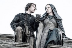 Alfie Allen and Sophie Turner are seen in a still from 