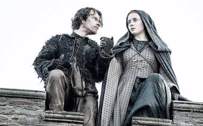 Alfie Allen and Sophie Turner are seen in a still from "Game of Thrones" Season 5.