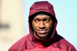 Robert Griffin III of the Washington Redskins looks on before the game against the New England Patriots.