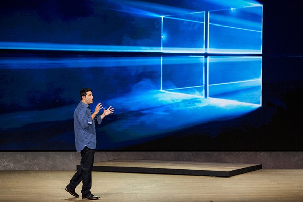 Terry Myerson, executive vice president of operating systems at Microsoft, speaks for new Windows 10 products at a media event in 2015. 