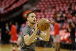 Stephen Curry warms up before playing in game 4 of the first round of the Western Conference playoffs. 