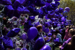 A crowd of fans gathered outside the Paisley Park compound, some brought balloons and wore the musician's favorite color: purple.