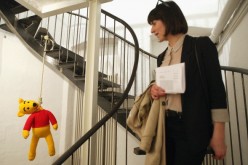 The knitted sculpture 'Winnie Pooh' by Patricia Waller, featuring the children's book character as a suicide victim, hangs in the 'Broken Heroes' exhibition at the Deschler Gallery on April 26, 2012 in Berlin, Germany. 
