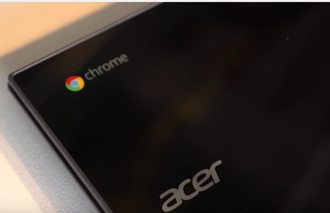 An Acer Chromebook with the Google Chrome and Acer logos shown on its display panel.
