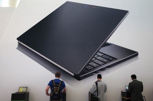Attendees inspect the Google Chromebook Pixel laptop during the Google I/O developers conference at the Moscone Center on May 15, 2013 in San Francisco, California. 