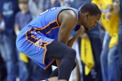Kevin Durant dives for the lose ball against Mike Conley.