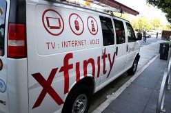 A Comcast service vehicle is seen parked on July 13, 2015 in San Francisco, California.